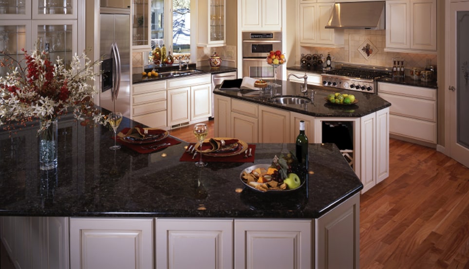How do you clean granite sinks?